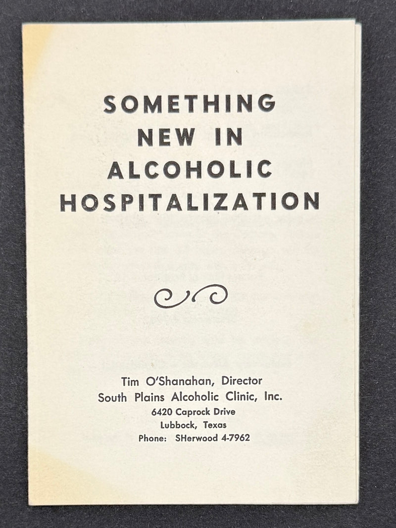 A vintage booklet or pamphlet cover titled 'SOMETHING NEW IN ALCOHOLIC HOSPITALIZATION' on an off-white background, photographed against a dark textured surface.
